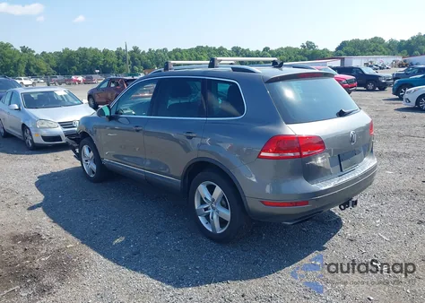 2014 Volkswagen Touareg 3.6L Lux z USA, uszkodzony, nr VIN WVGEF9BP1ED009269